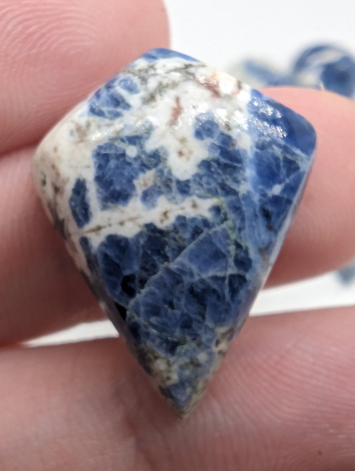 Porcelain Sodalite - 7pc Pear Cabs - 112.30cts(22.47g)