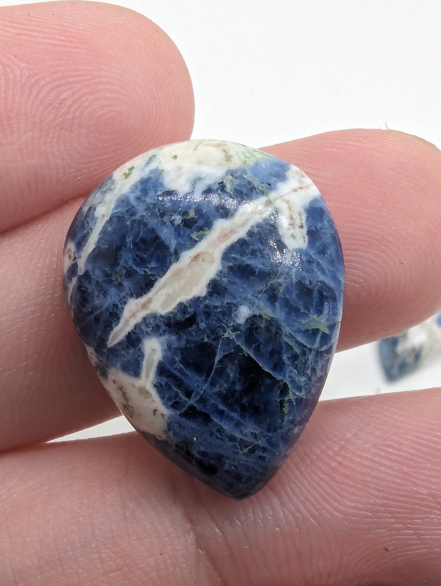 Porcelain Sodalite - 7pc Pear Cabs - 112.30cts(22.47g)