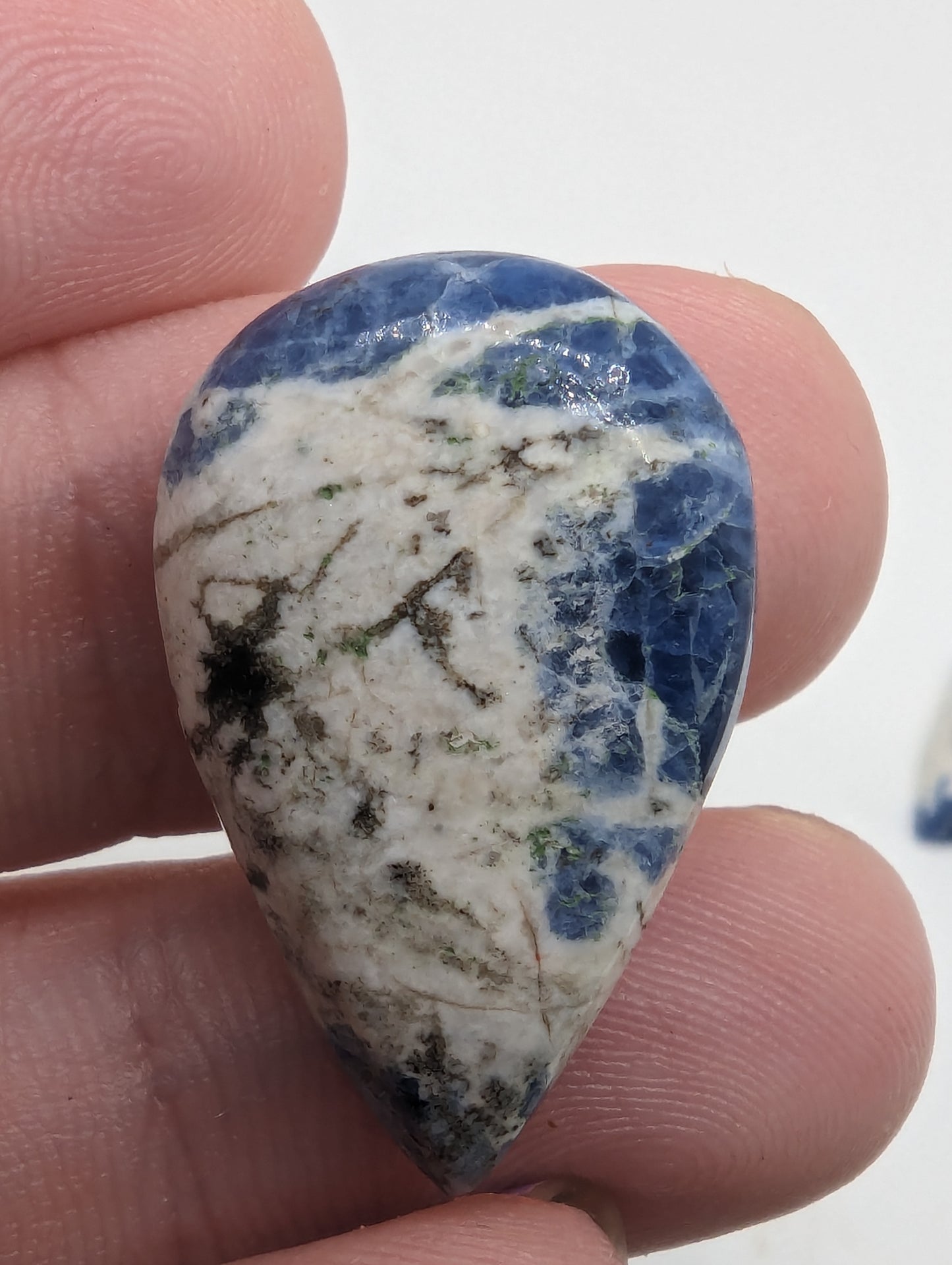 Porcelain Sodalite - 7pc Pear Cabs - 112.30cts(22.47g)