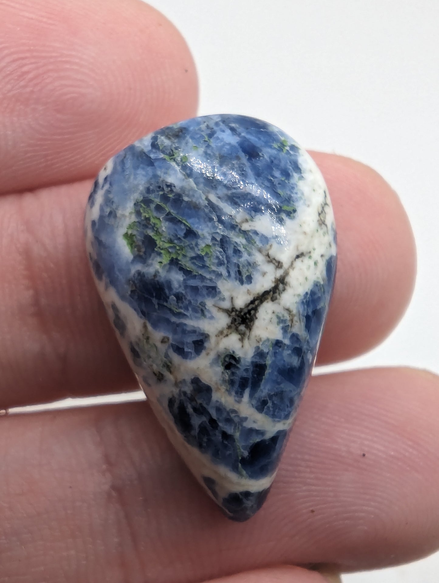 Porcelain Sodalite - 7pc Pear Cabs - 112.30cts(22.47g)