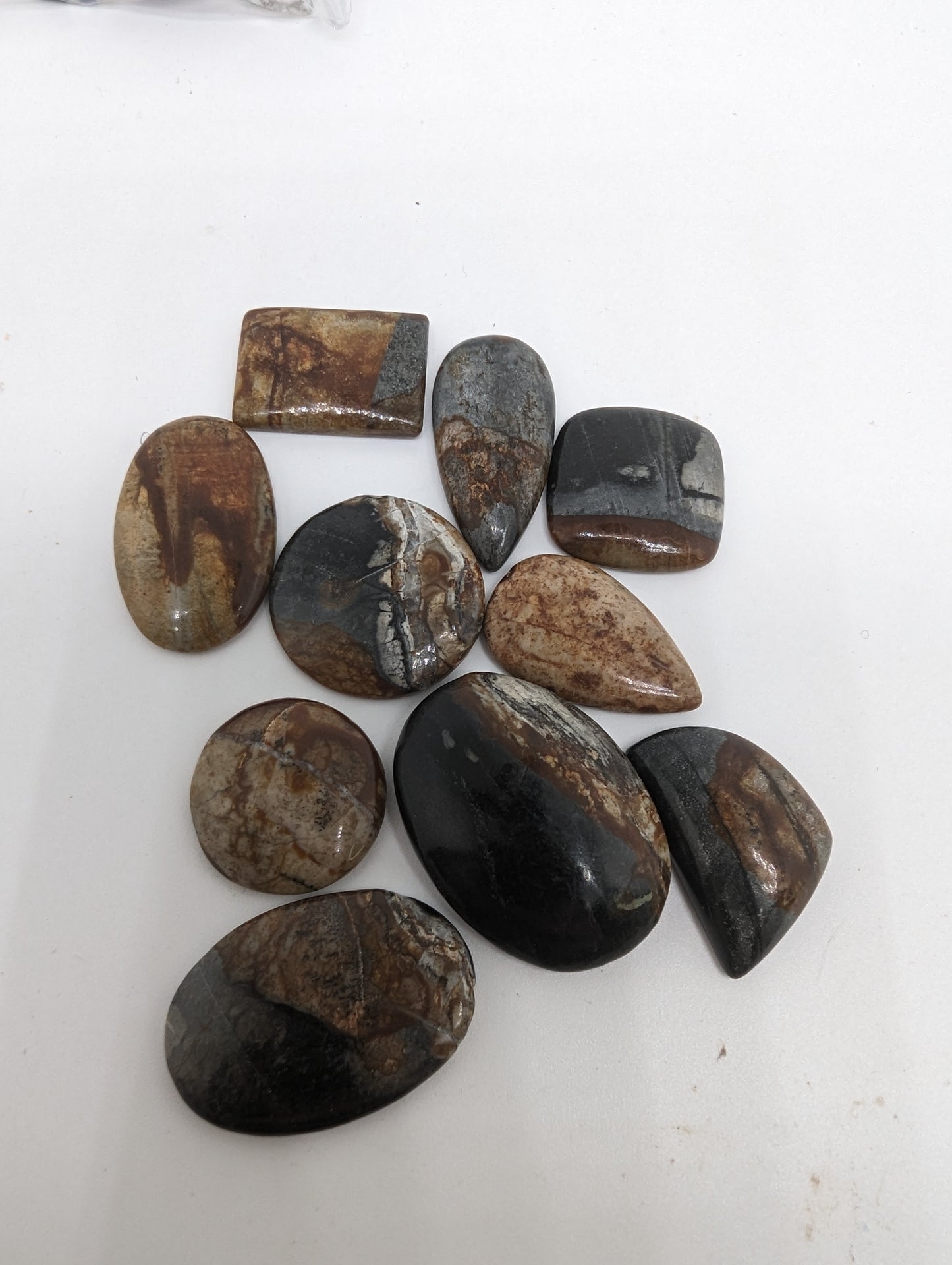 Picasso Jasper - 10pc Cabochon Lot - 125.80cts(25.20g)