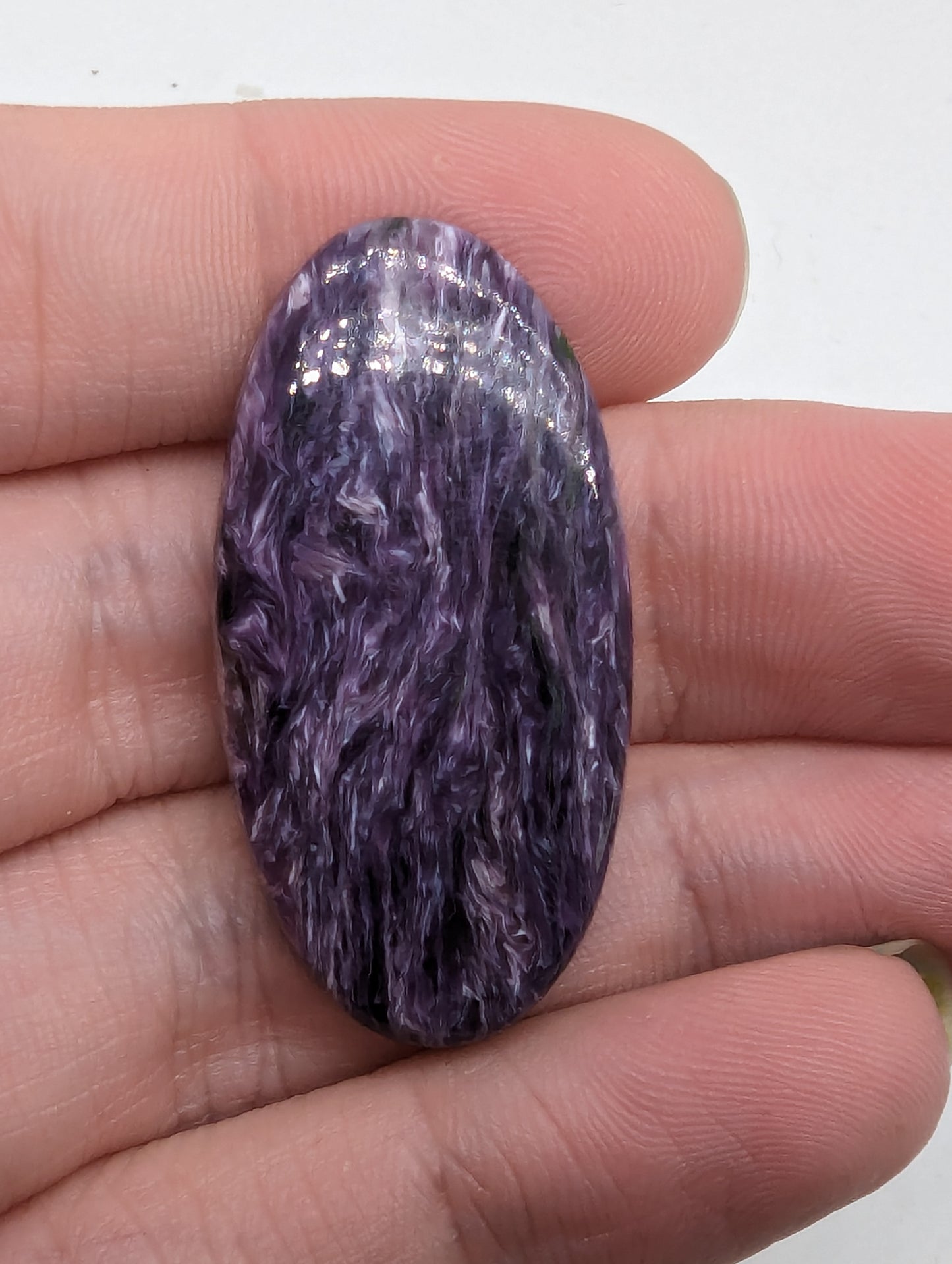 Charoite Oval - Flashy - 
34.75cts(6.95g) - 
40mm