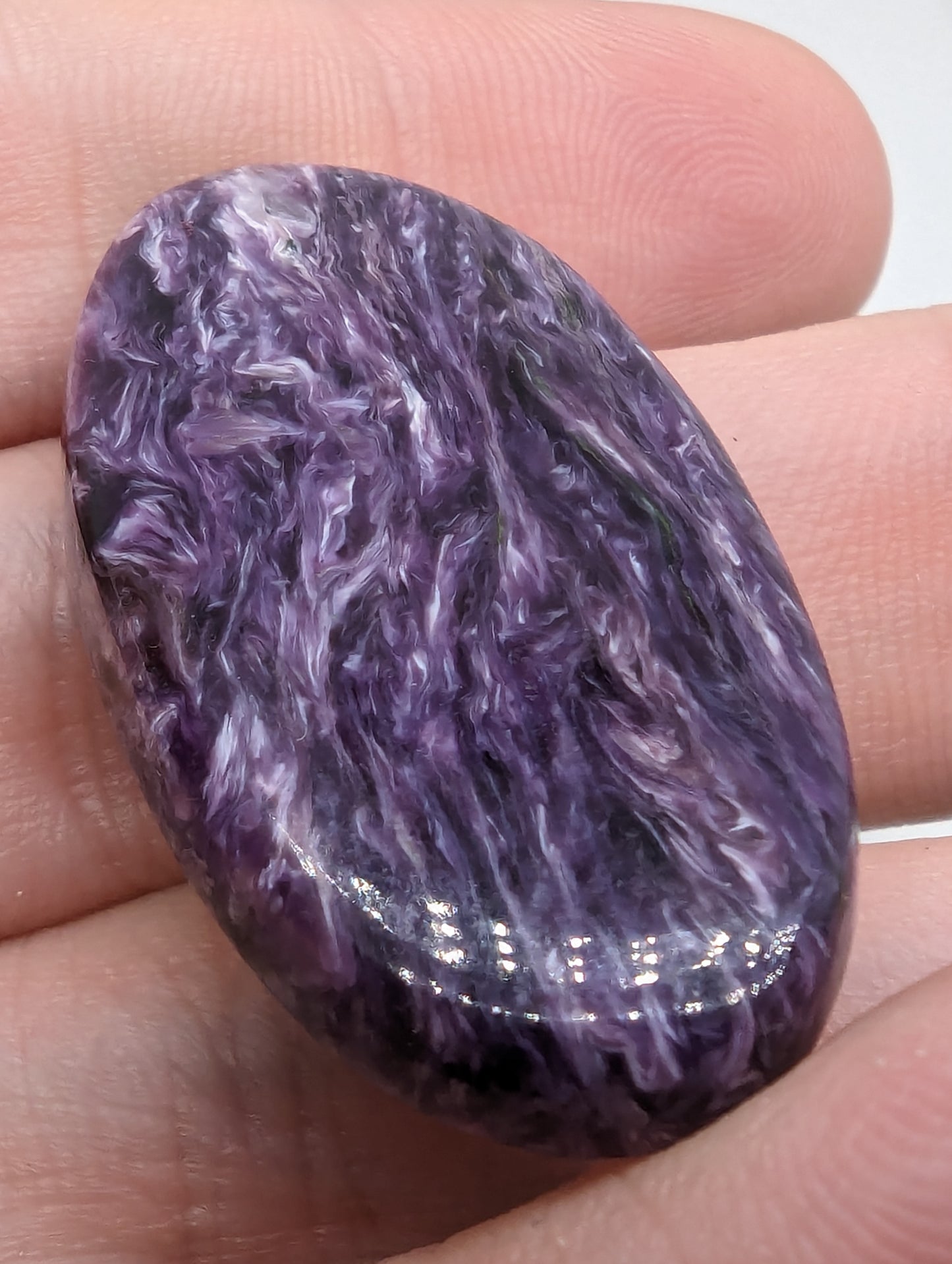 Charoite Oval - Flashy - 
34.75cts(6.95g) - 
40mm