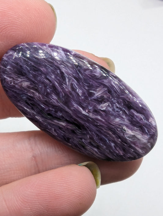 Charoite Oval - Flashy - 
34.75cts(6.95g) - 
40mm