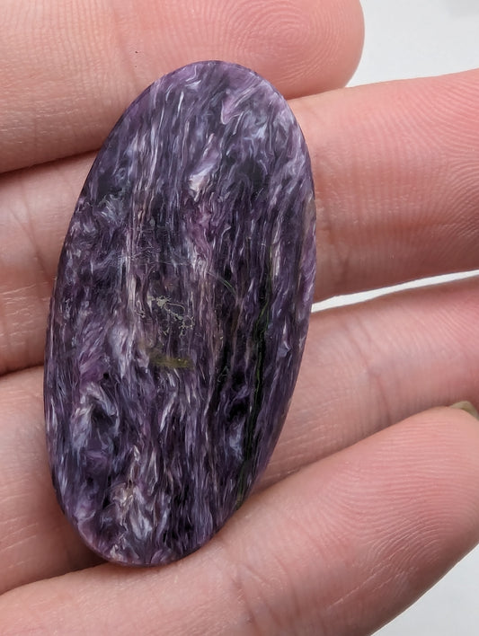 Charoite Oval - Flashy - 
34.75cts(6.95g) - 
40mm