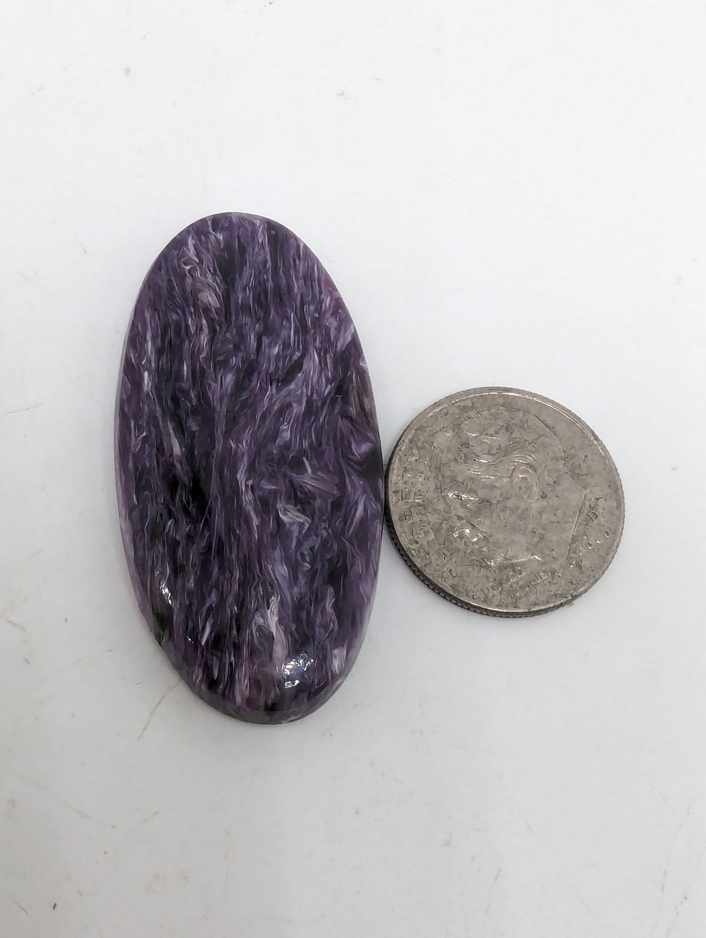 Charoite Oval - Flashy - 
34.75cts(6.95g) - 
40mm