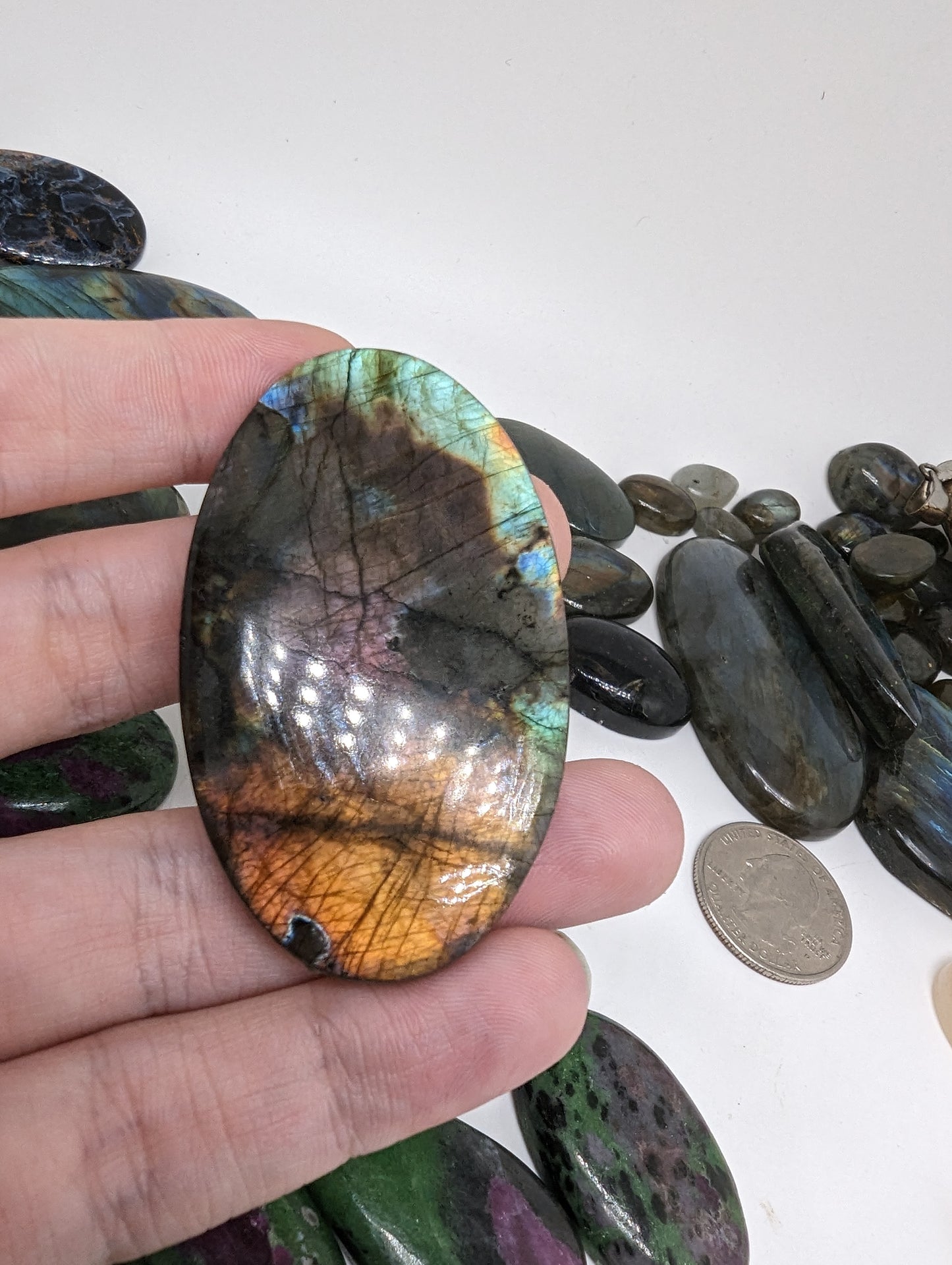 Sunset Flash Labradorite(Madagascar Spectralite) - 143.10cts(28.64g) - 
62mm