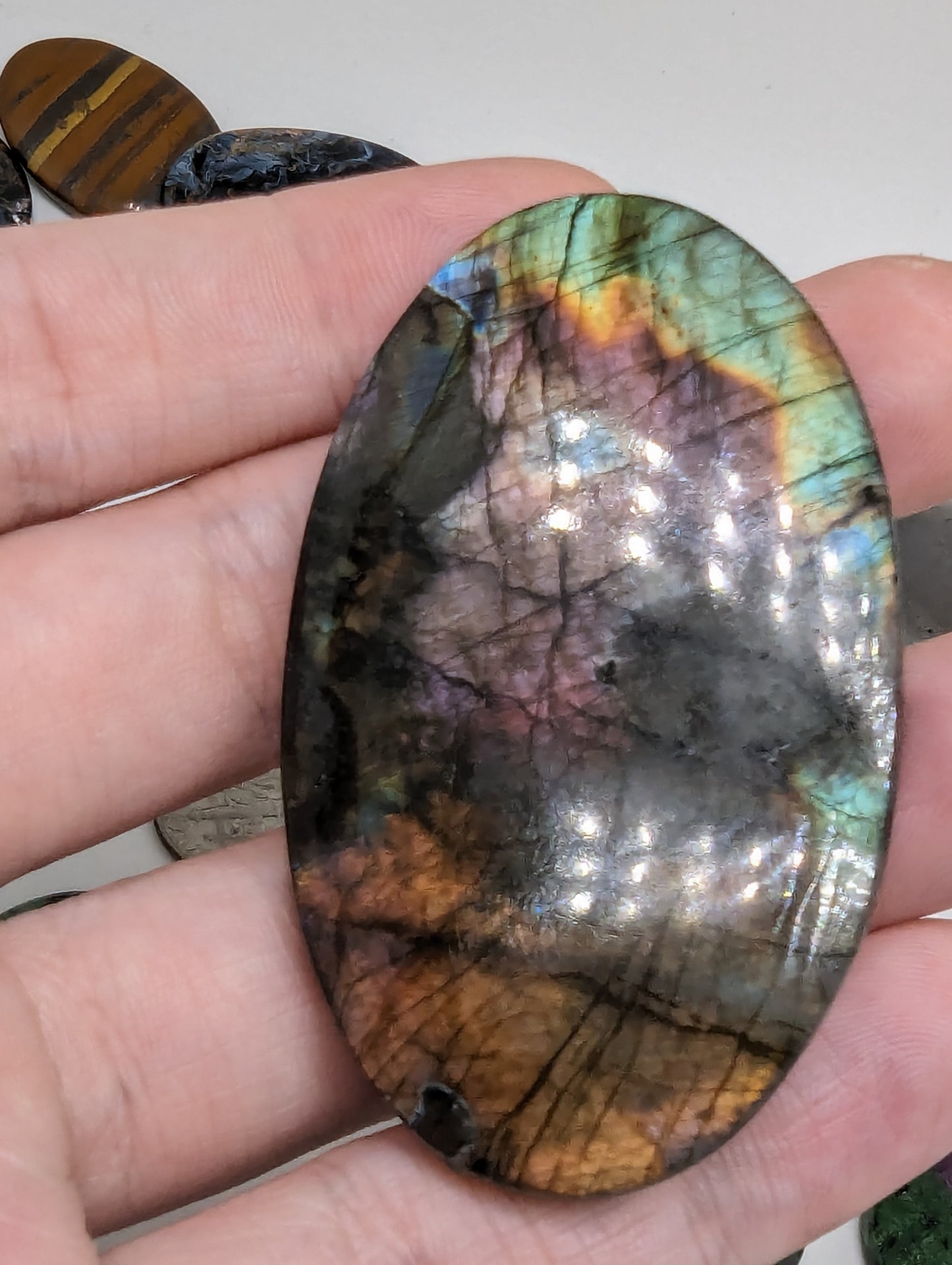 Sunset Flash Labradorite(Madagascar Spectralite) - 143.10cts(28.64g) - 
62mm