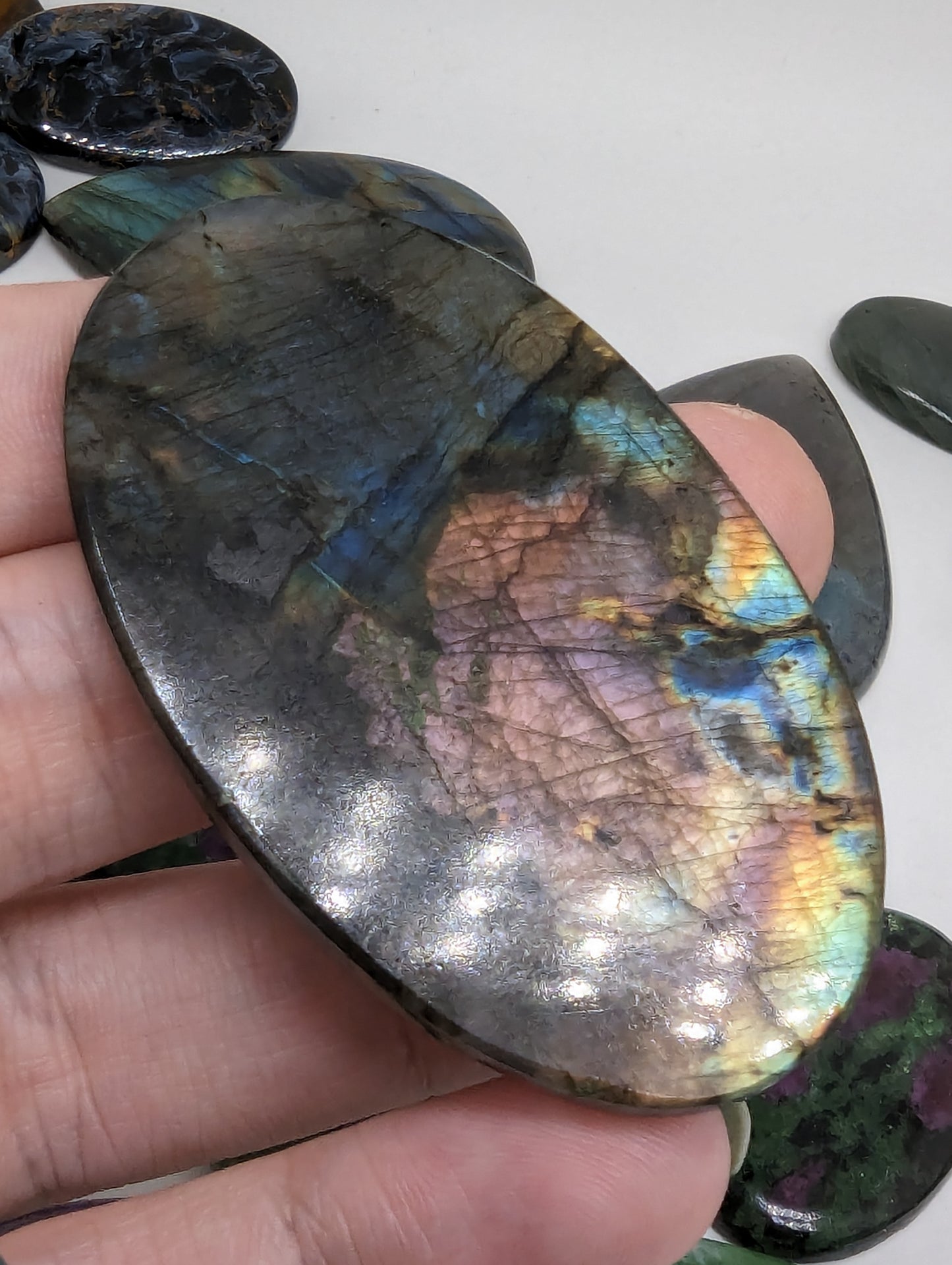 Sunset Flash Labradorite(Madagascar Spectralite) - 143.10cts(28.64g) - 
62mm