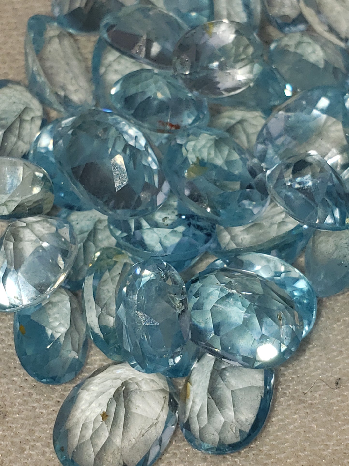 Swiss Blue Topaz Facets - Ovals - Brilliant Blue - 1-2.5 carats per piece