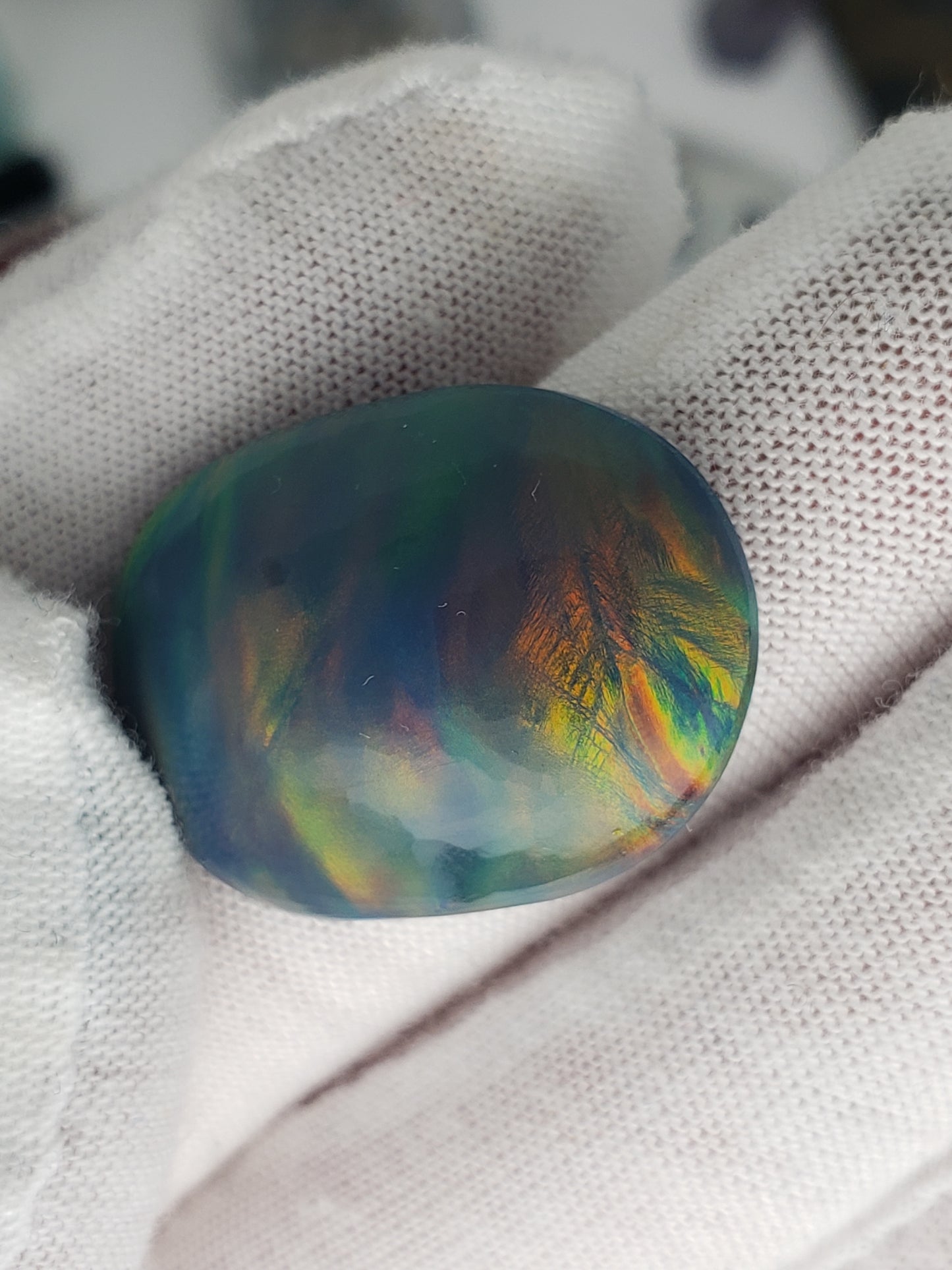 Aurora Opal (Dan Omen cut) 14.7 carat - oval medium dome - 27.4mm