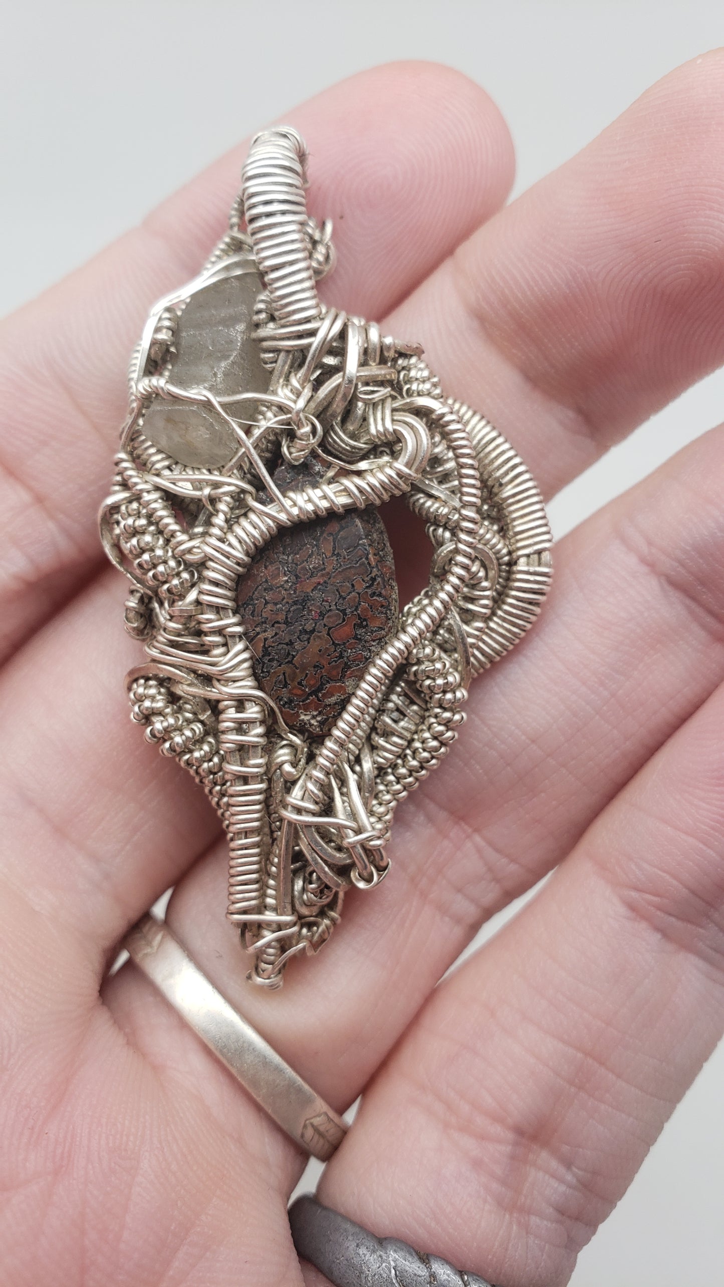 Dino Bone and Sapphire in Silver Wire Wrap Pendant