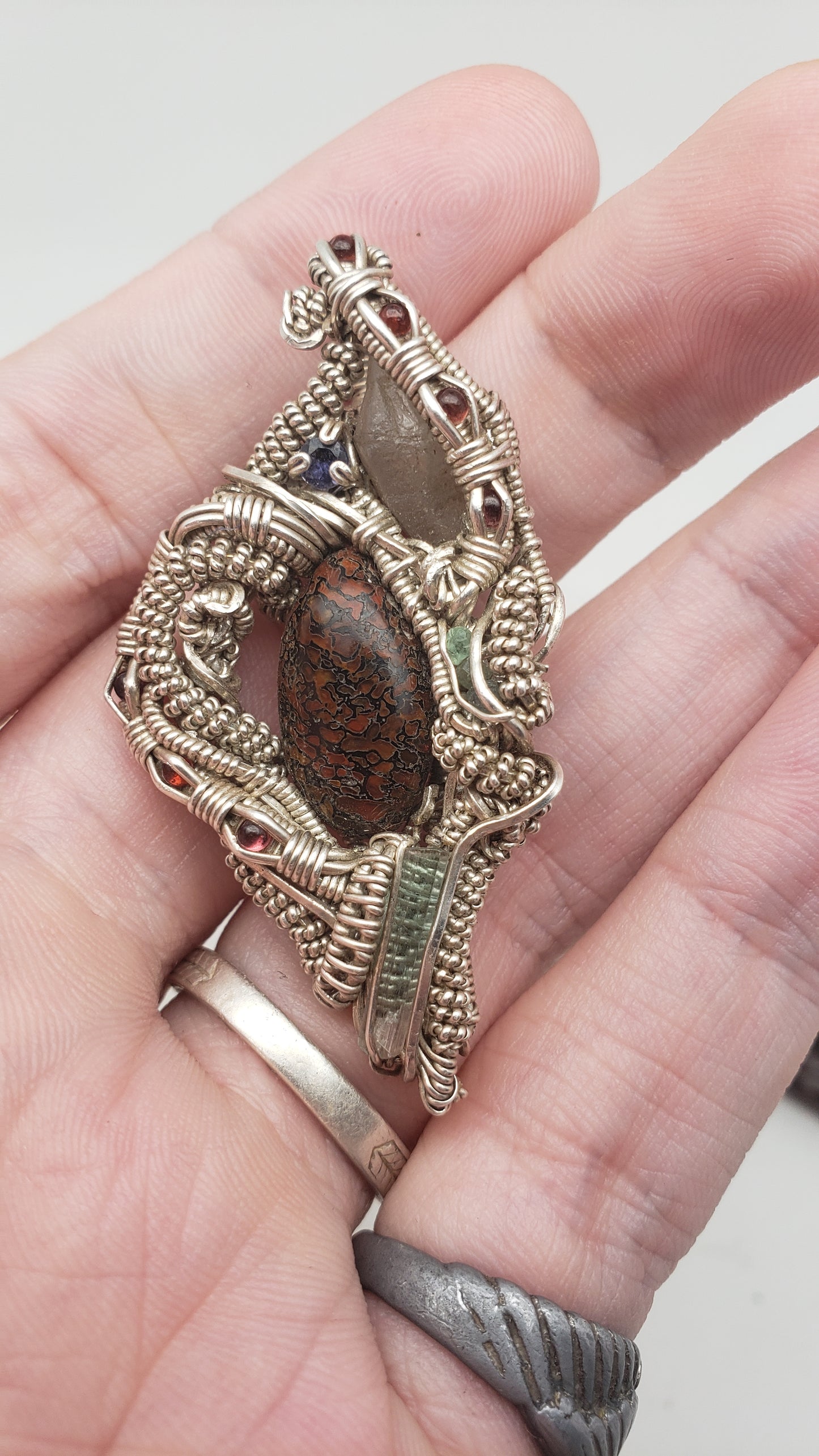 Dino Bone and Sapphire in Silver Wire Wrap Pendant