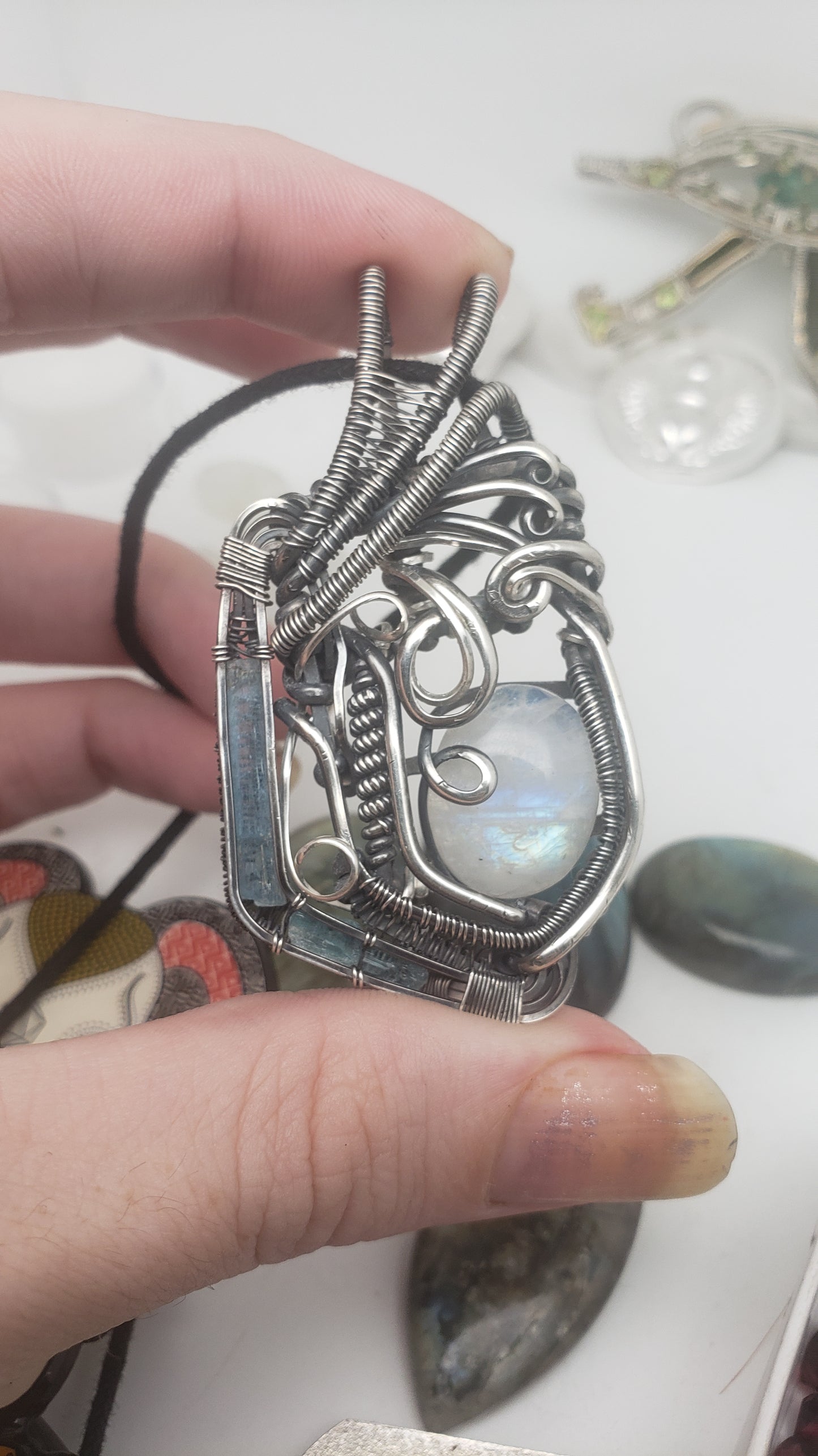 Rainbow Moonstone in Silver Wire Wrap Pendant